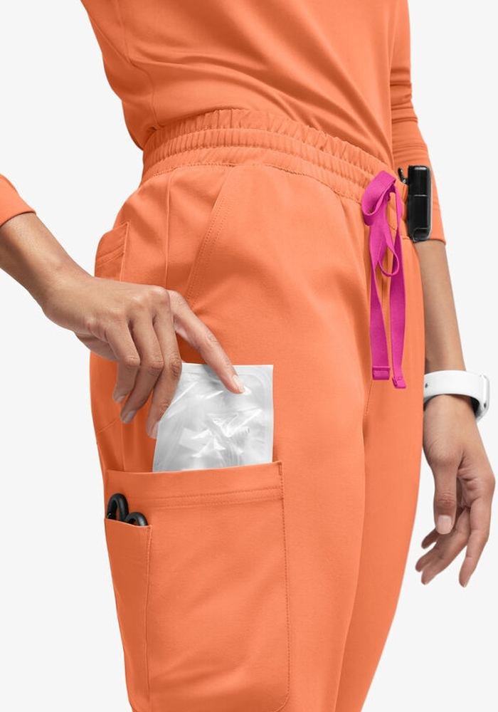 Women's Orange Cargo Scrub Pants in Orange — Premium FIONx stretch fabric private label scrubs